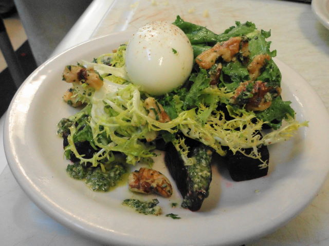 Roasted beets and curly endive with walnuts, parsley-walnut pistou and a soft boiled egg.