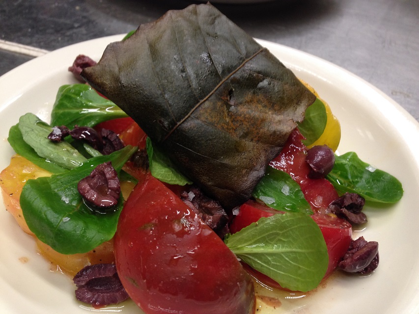 Local tomatoes with lamb lettuce, Nicoise olives, olive oil, house made red wine vinegar and grilled chestnut wrapped goat cheese.