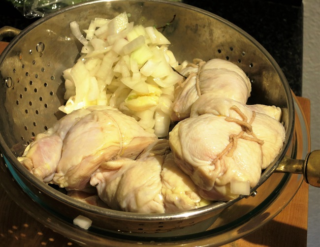 The next day, the chicken is drained and the marinade saved.