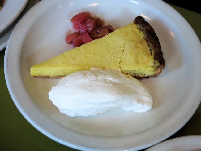 Lemon tarte, rhubarb compote and whipped cream.
