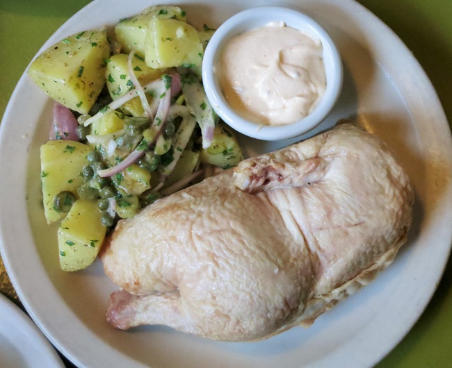 Cold roasted Washington grown half chicken, served with mayonnaise and a warm Alsatian-style potato salad