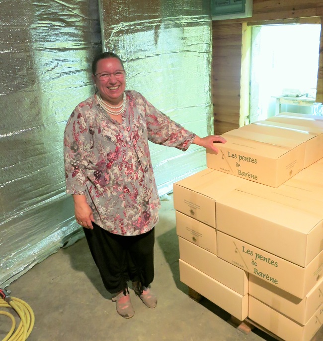 Gaelle in the cave, where she and Daniel make, bottle and pack their wine by hand.