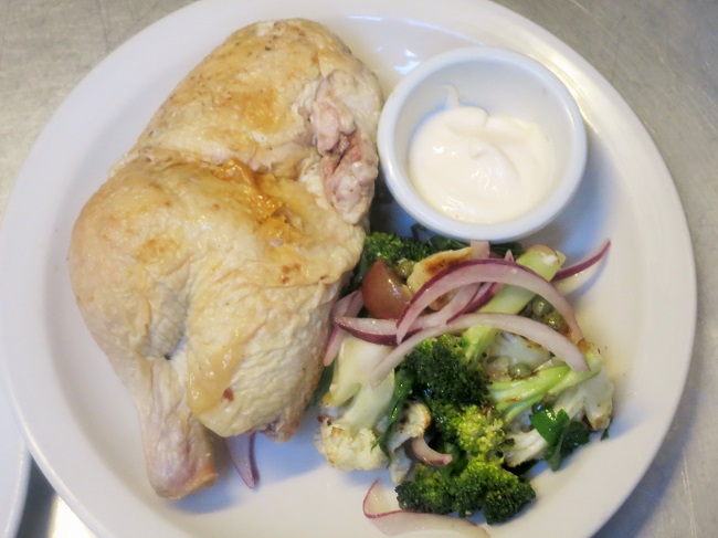 Roasted half WA natural chicken, served cold with mayonnaise and a cold salad of roasted broccoli and cauliflower, red onions, red grapes, capers and parsley with anchovy vinaigrette