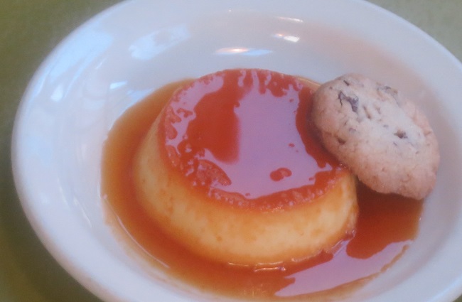 Butternut squash creme caramel served with a pecan shortbread cookie