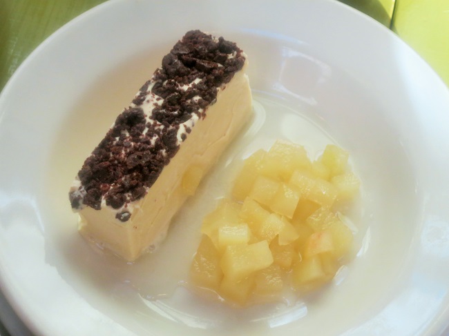 Bourbon ice cream terrine  with crunchy chocolate crust, with white wine-spice poached pears