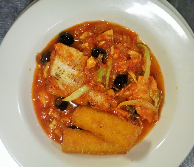 True cod and salt cod simmered with tomato, fennel, garlic and nicoise olives, served with crispy cornmeal miques