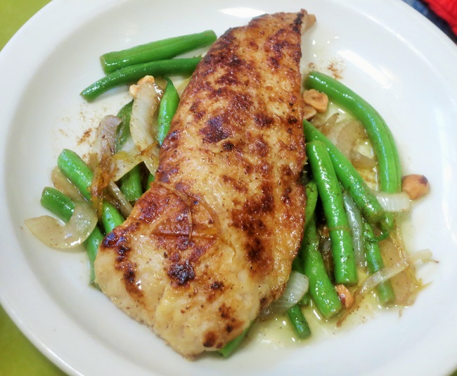 Local rockfish filet, dusted with hazelnut flour and pan roasted a la meuniere, with green beans, hazelnuts, sweet onion and candied lemon brown butter