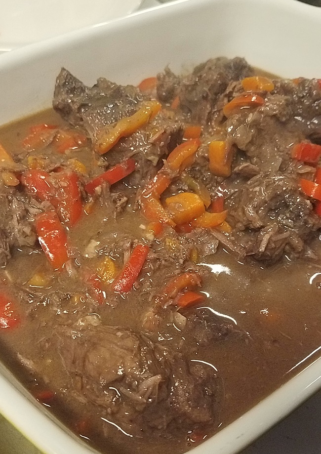 Bull from Old Chaser Farm on Vashon Island, simmered with red wine, orange peel and sweet peppers, served with brown rice
