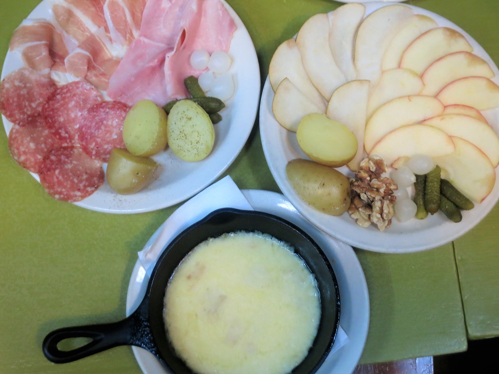 Our famous Raclette Savoyarde is back on the menu for the season, with your choice of the traditional cold cuts and pickles or with pears, apples and walnuts