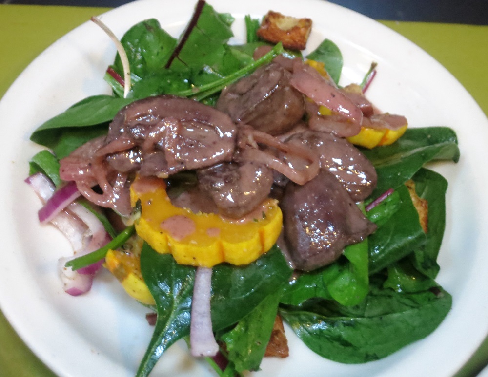 Salad of spinach, dandilion greens, red onion, roasted Delicata squash and croutons with a warm duck heart-shallot vinaigrette
